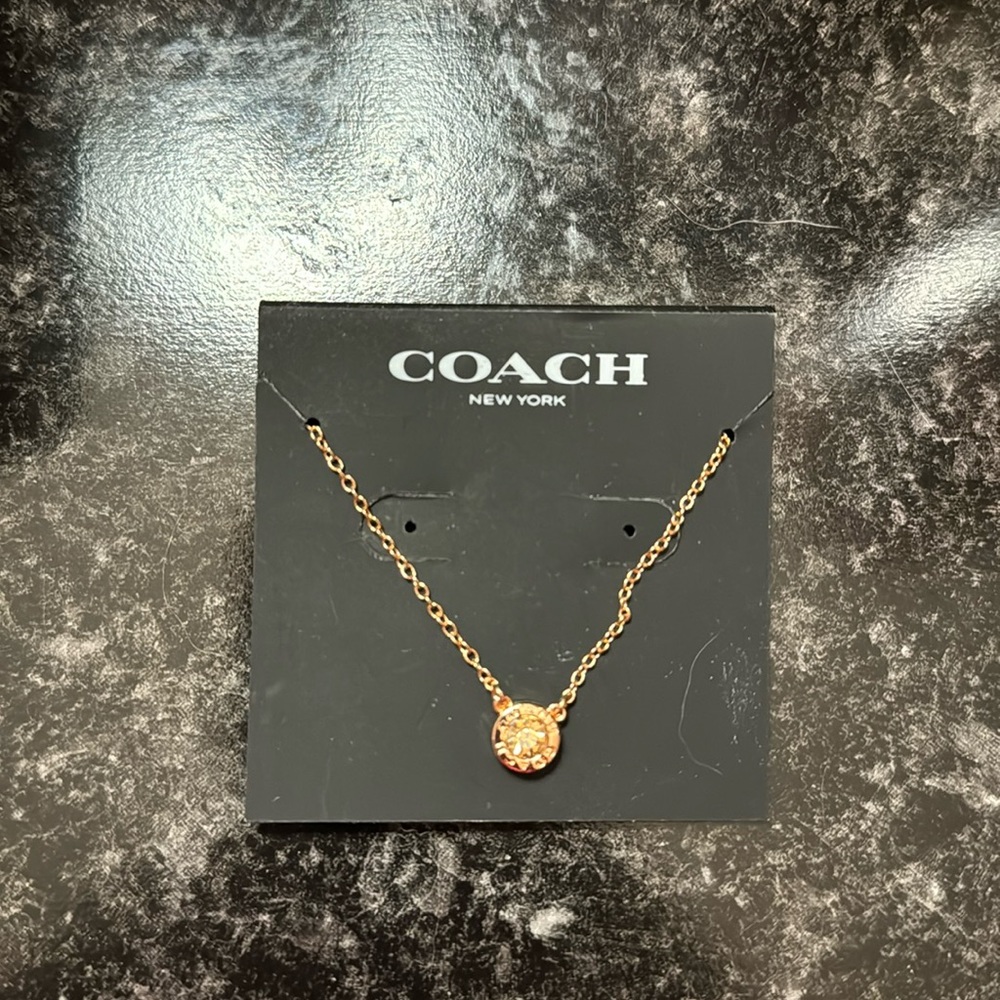 COACH rose gold pendant necklace